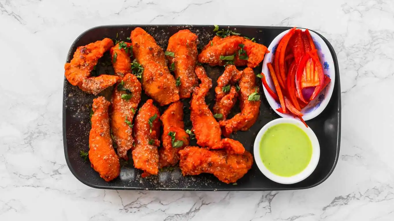 Fish Pakora — crispy battered fish fritters at Singh Sweet Mahal, Winnipeg